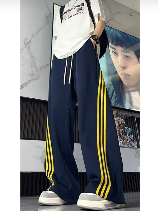 Vintage muške trenerke hlače s kontrastnim prugama, široke, hip-hop stil, proljeće-jesen, bijele