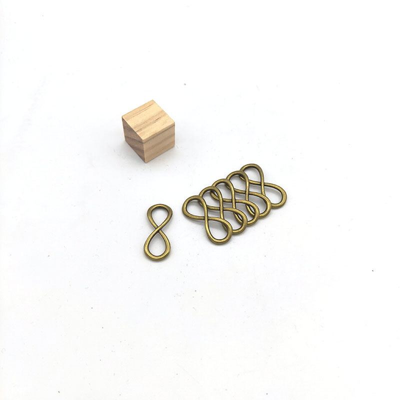 DIY legura nakit dodaci – simbol beskonačnosti (oblik osmice), 13 × 32 mm, 50 komada u paketu