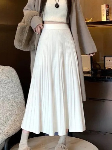 Ženska pletena suknja za jesen i zimu, opuštenog kroja, vizualno oblikuje figuru, plisirana, casual stil, srednja duljina, široki rub.