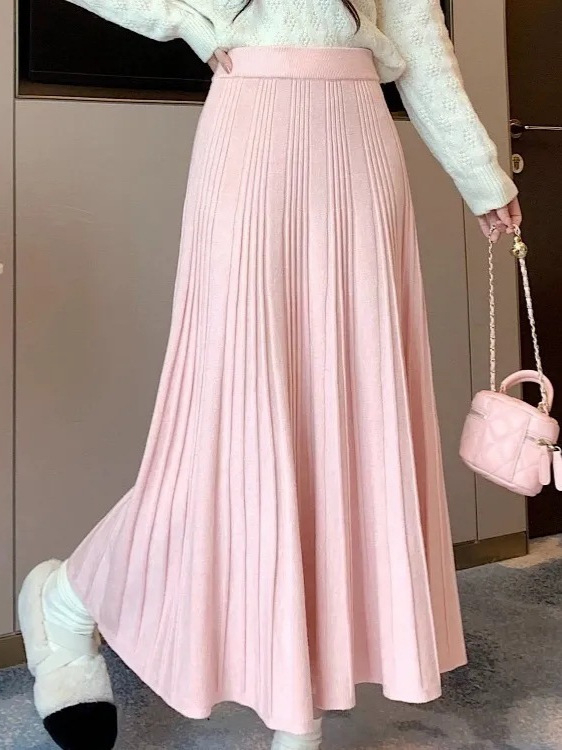 Ženska pletena suknja za jesen i zimu, opuštenog kroja, vizualno oblikuje figuru, plisirana, casual stil, srednja duljina, široki rub.