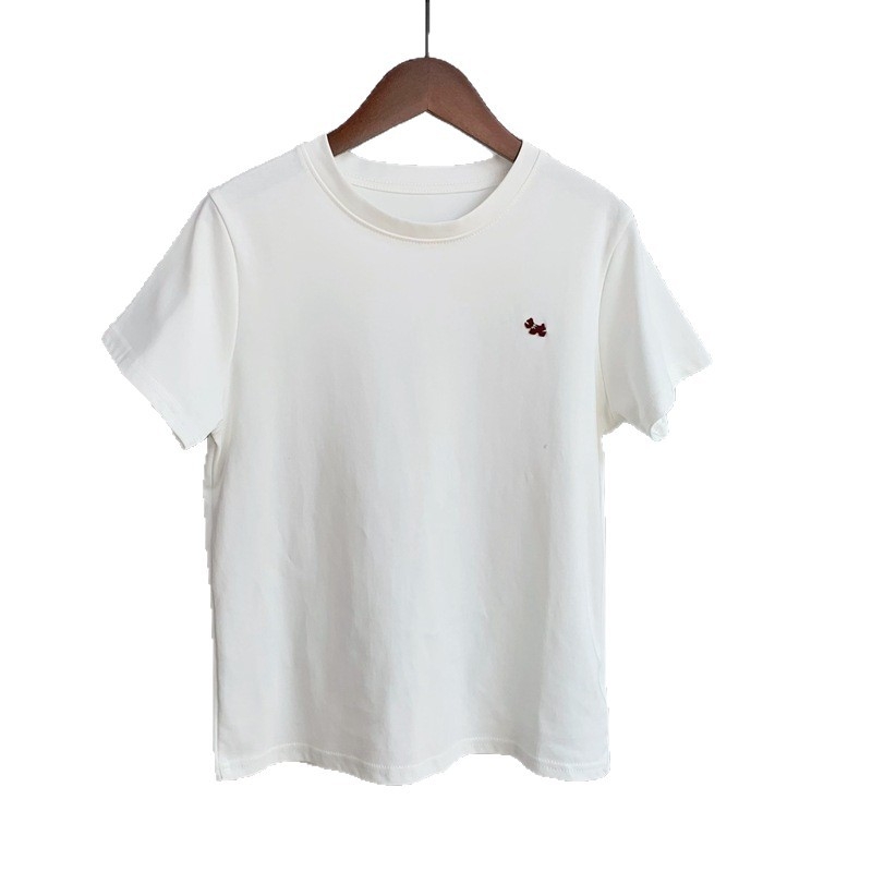 Ženski bijeli T‑shirt kratkih rukava s okruglim izrezom, uski kroj, smjesa poliester, minimalistički stil, ljeto 2026