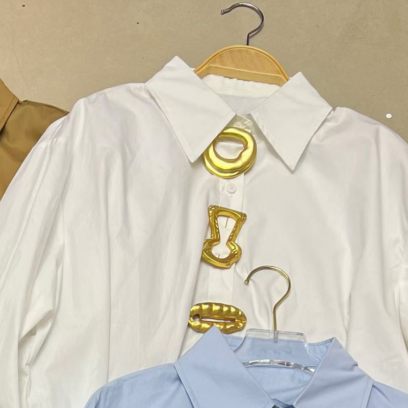 Ženska bluza s dugim rukavima, polo ovratnik, slobodan kroj, jednobojna, poliester.