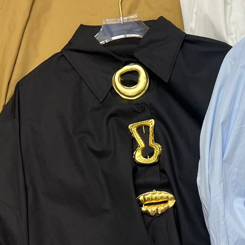 Ženska bluza s dugim rukavima, polo ovratnik, slobodan kroj, jednobojna, poliester.