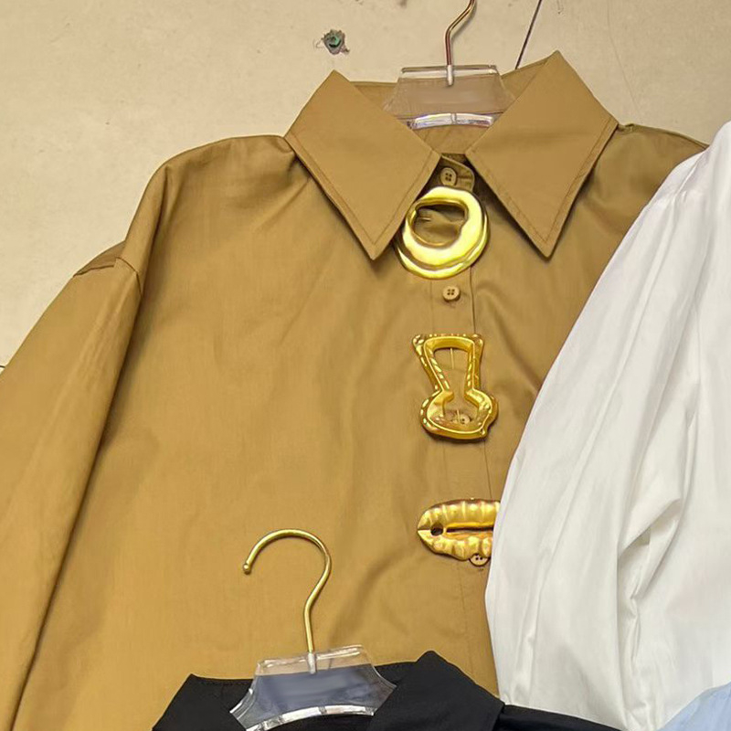 Ženska bluza s dugim rukavima, polo ovratnik, slobodan kroj, jednobojna, poliester.