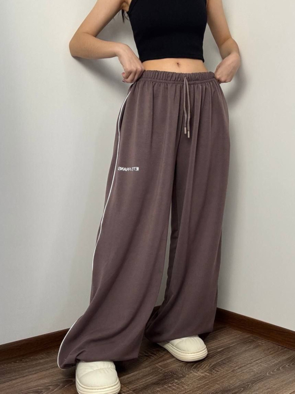 Ženske hlače u američkom stilu, široke i opuštene, visokim strukom, vezivanje špage, pokrivaju bokove, svakodnevni streetwear, do poda