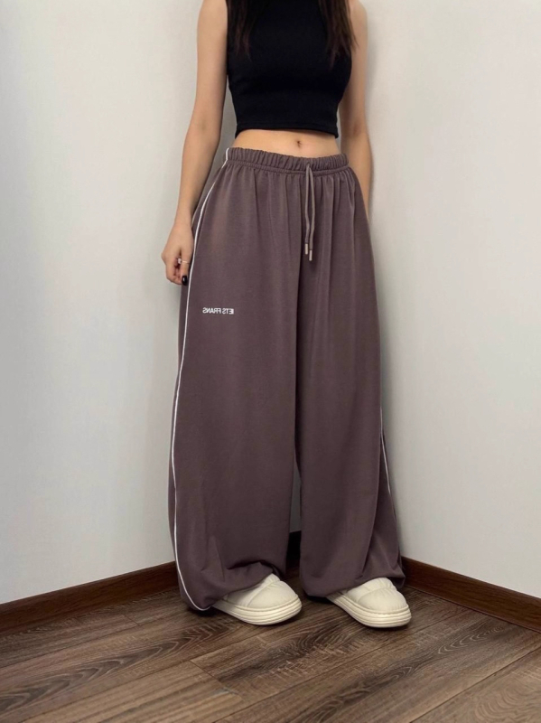 Ženske hlače u američkom stilu, široke i opuštene, visokim strukom, vezivanje špage, pokrivaju bokove, svakodnevni streetwear, do poda