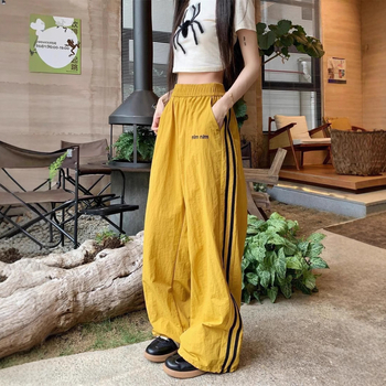 Ženske sportske hlače od ledene svile za brzo sušenje, jogger stil, lagane ljetne hlače s bočnim trakama, straight ili wide-leg kroj