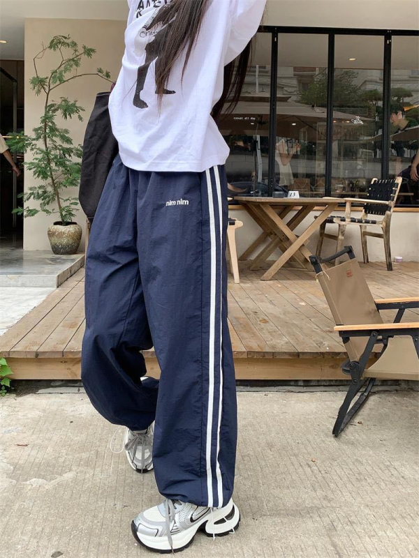 Ženske sportske hlače od ledene svile za brzo sušenje, jogger stil, lagane ljetne hlače s bočnim trakama, straight ili wide-leg kroj