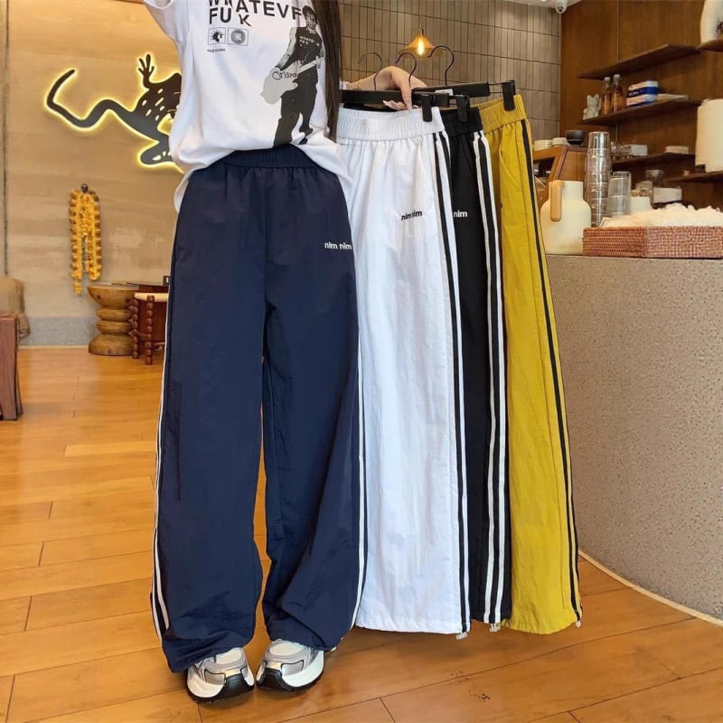 Ženske sportske hlače od ledene svile za brzo sušenje, jogger stil, lagane ljetne hlače s bočnim trakama, straight ili wide-leg kroj