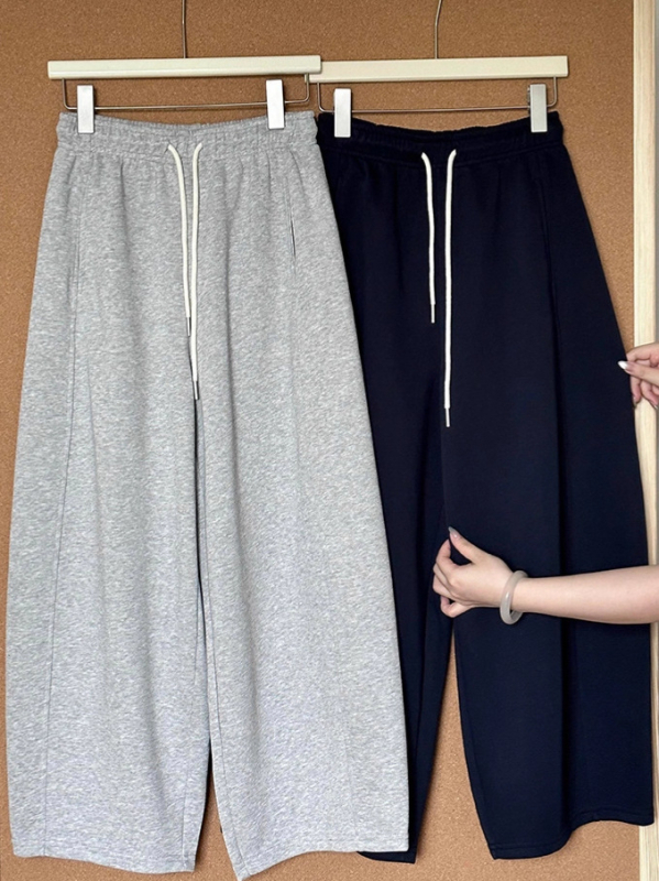 Ženske hlače s visokim strukom i vezicom, širokog kroja, scimitar kroj, drapirane, jesenski stil
