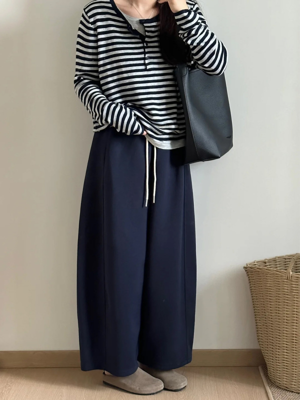 Ženske hlače s visokim strukom i vezicom, širokog kroja, scimitar kroj, drapirane, jesenski stil