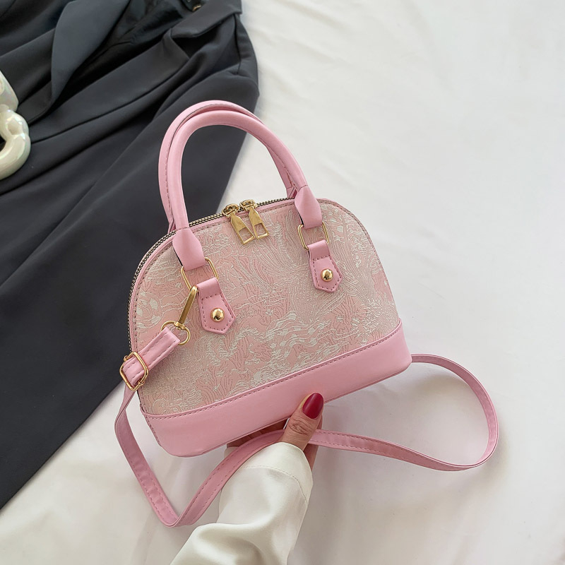 Ženska torbica tip školjka, korejskog stila, moderan i jednostavan dizajn, ramenska i crossbody torba, model 2023