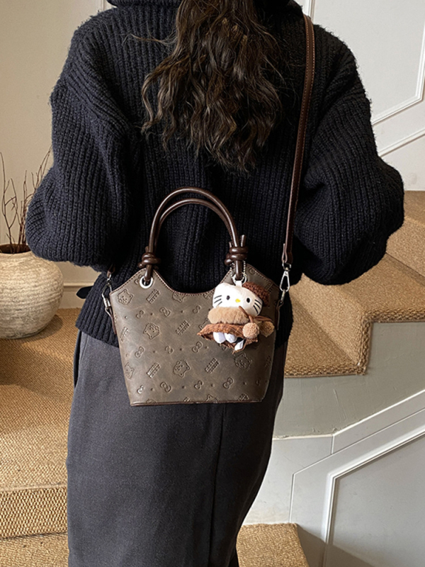 Ženska bucket torba s reljefom, vintage stil, elegantan i minimalistički dizajn, za rameni ili crossbody, izdanje 2025