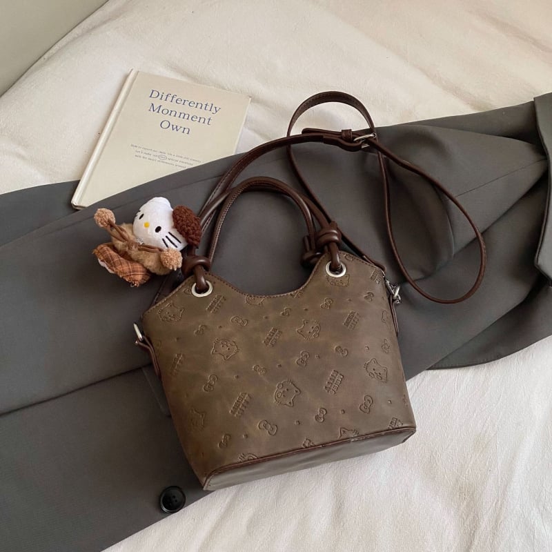 Ženska bucket torba s reljefom, vintage stil, elegantan i minimalistički dizajn, za rameni ili crossbody, izdanje 2025