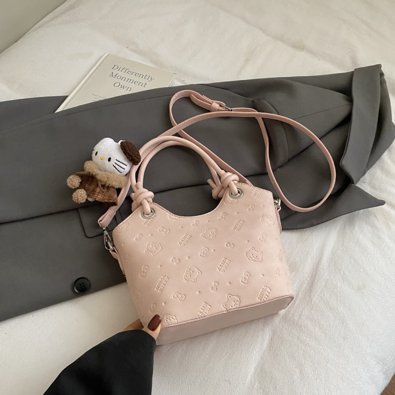 Ženska bucket torba s reljefom, vintage stil, elegantan i minimalistički dizajn, za rameni ili crossbody, izdanje 2025