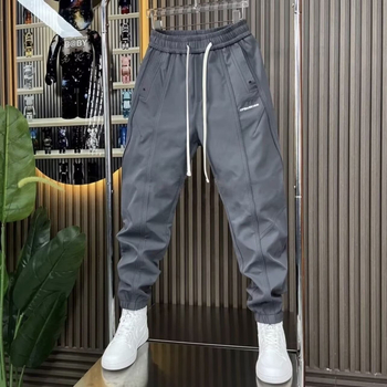 2024 téli férfi patchwork fleece-bélelt sportos nadrág, lazán szabott, gumírozott szár
