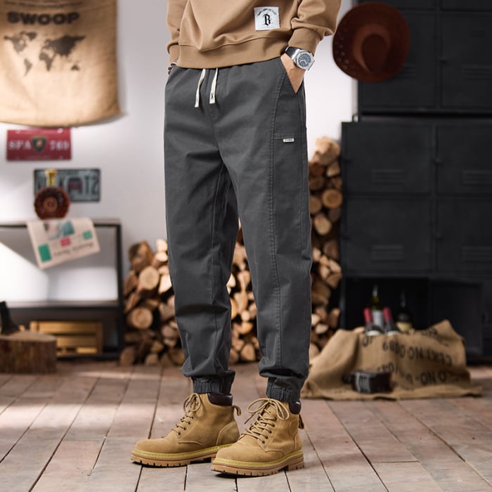 Férfiaknak: elasztikus derekú jogger nadrág, laza szabású, hosszú casual nadrág húzózsinórral, hip-hop stílus