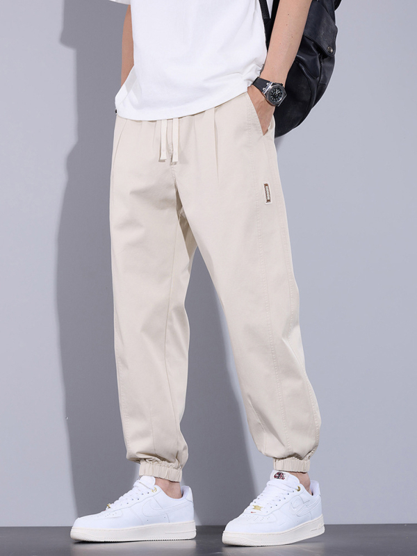 Férfi cropped nadrág, laza szabás, workwear-stílus, pamut-poliészter keverék, lélegző nyárra 2025