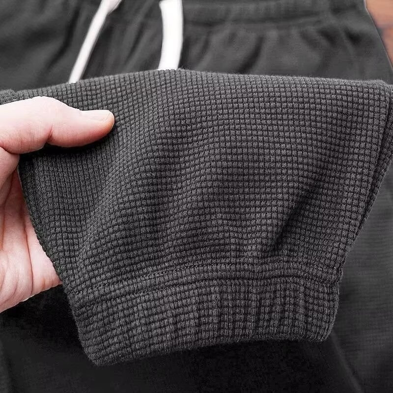 Férfi waffle mintázatú casual nadrág, laza szabás, koreai stílus, hosszú könnyű nadrág