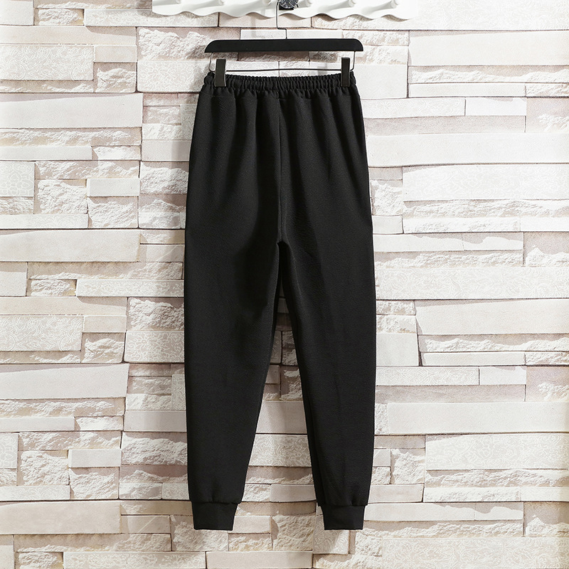 Férfi slim-fit sportos tréningnadrág, egyszínű, elasztikus