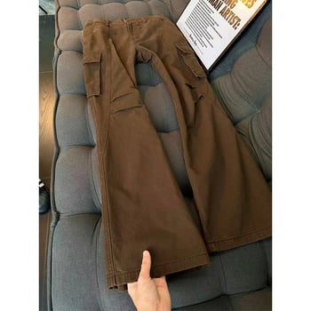 Crne muške traperice u workwear stilu sa zakrivljenim rubom, zimske, čist kroj, dojam visoke kvalitete, američki high-street stil s blagim širenjem nogavica