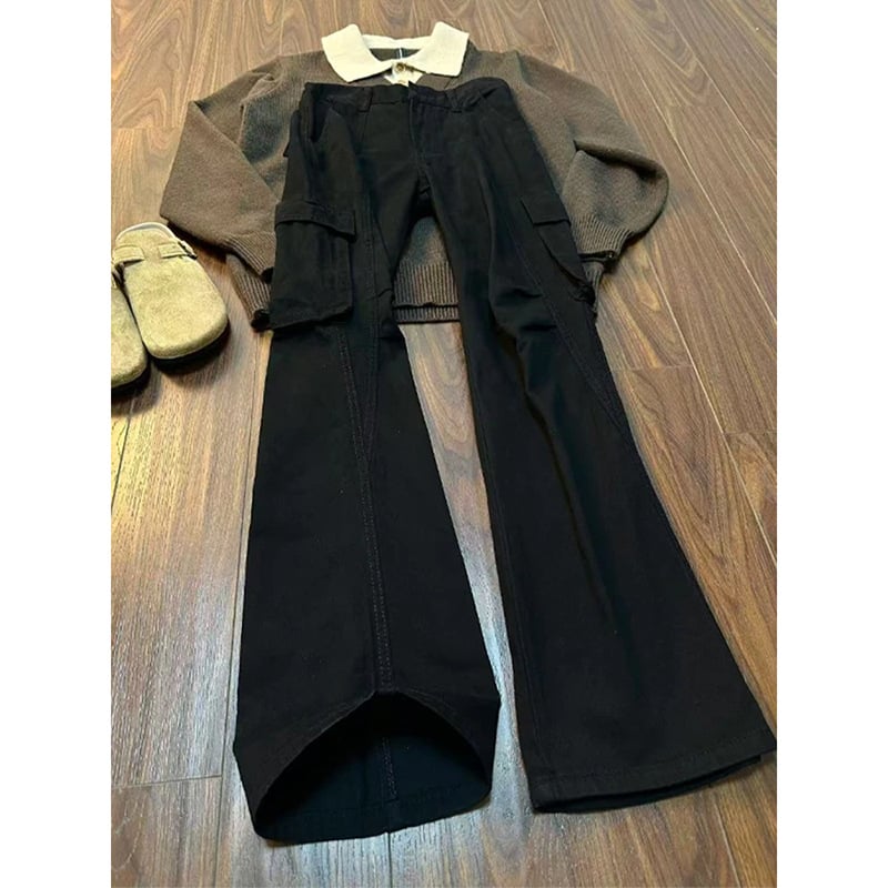 Crne muške traperice u workwear stilu sa zakrivljenim rubom, zimske, čist kroj, dojam visoke kvalitete, američki high-street stil s blagim širenjem nogavica