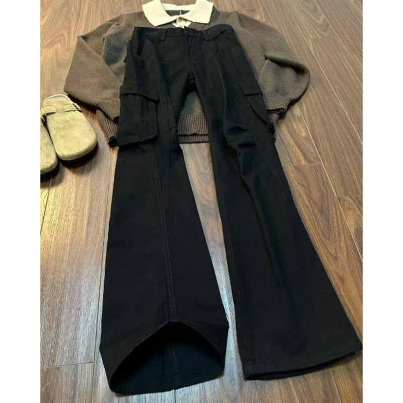 Crne muške traperice u workwear stilu sa zakrivljenim rubom, zimske, čist kroj, dojam visoke kvalitete, američki high-street stil s blagim širenjem nogavica