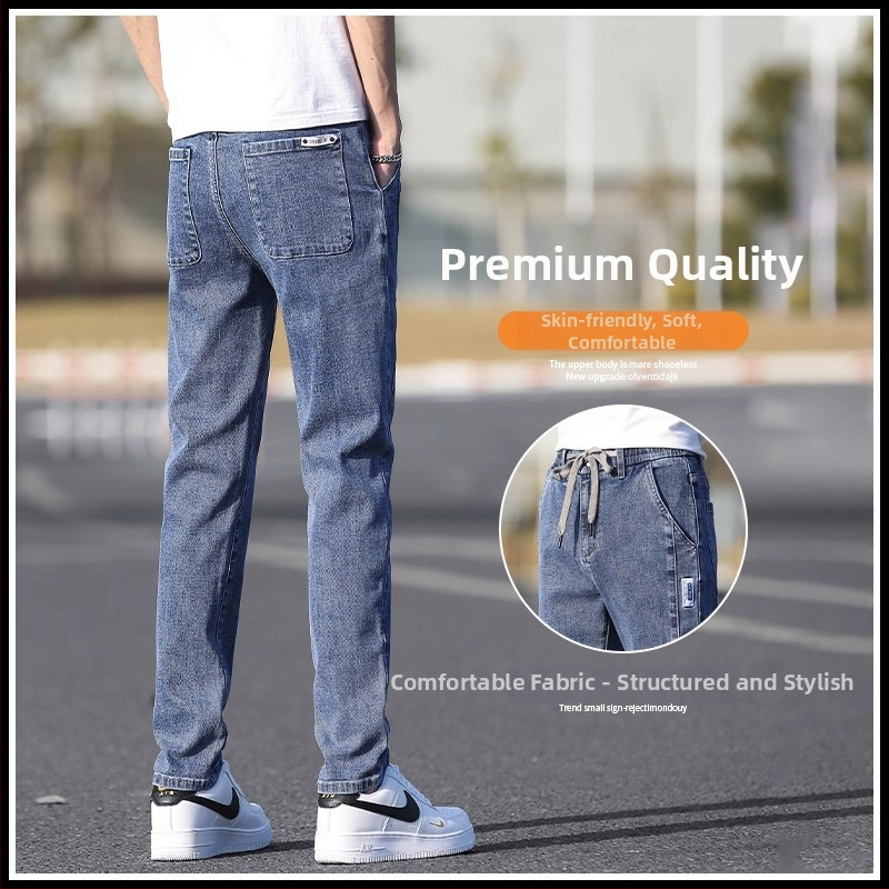 Őszi férfi farmernadrág elasztikus derékkal, karcsúsított szabás, enyhén szűkített egyenes szár, mosott denim