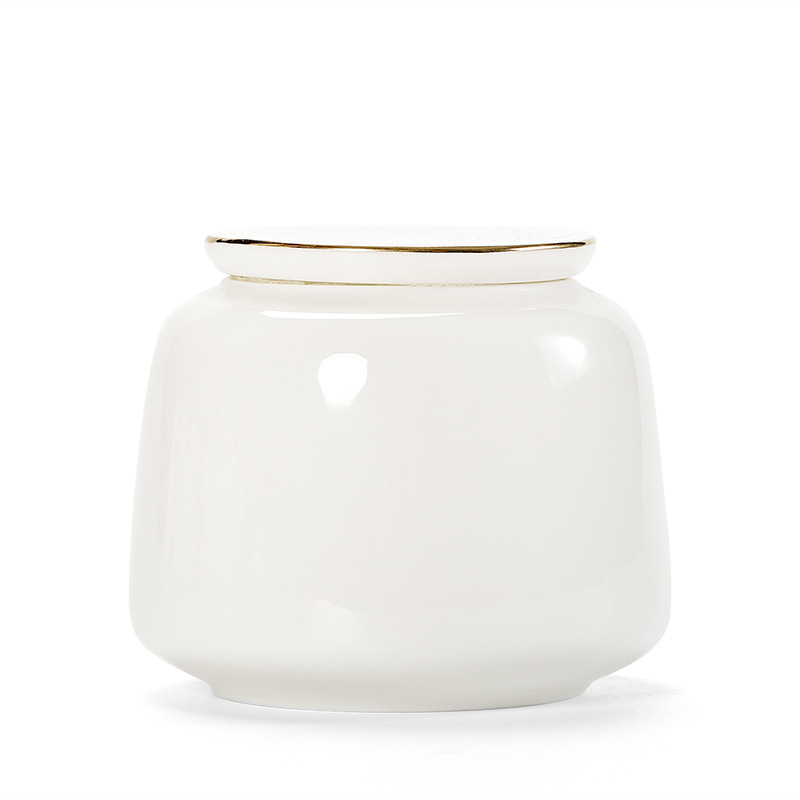 Mala bijela keramička posuda za čaj od bijelog porcelana, prijenosna i čvrstim zatvaranjem