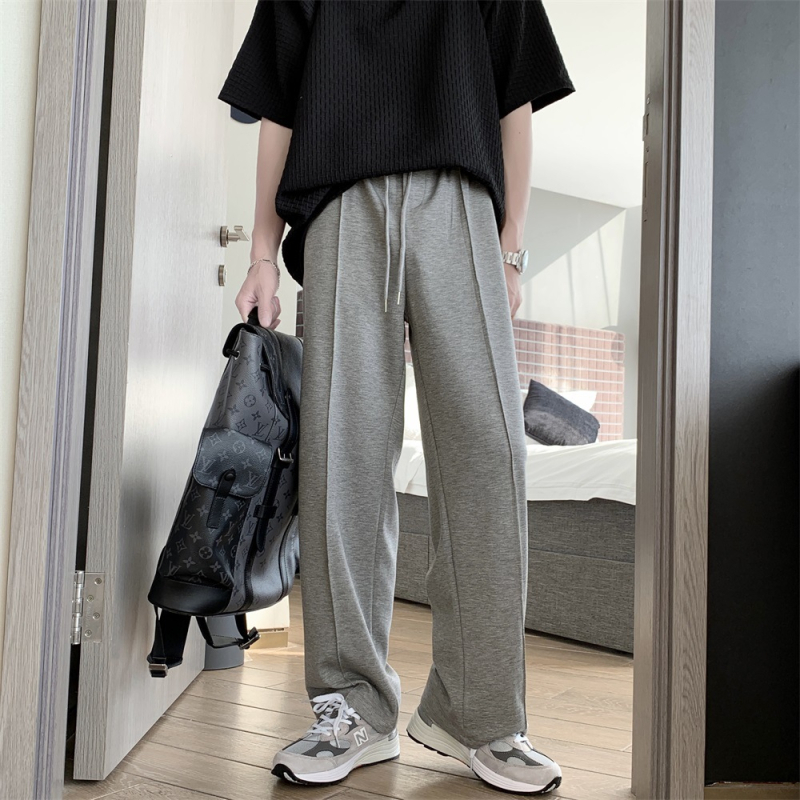 Bijele muške široke hlače od pamuka, urbani stil i vintage dizajn inspiriran Europom i Amerikom