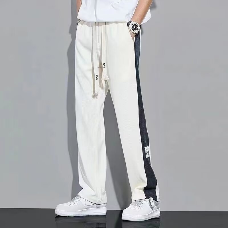 Nyári lezser férfi nadrágok, egyenes szabás, fehér, streetwear stílusú sportnadrág