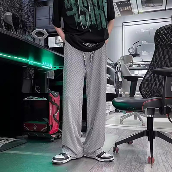 Férfi casual nadrág jacquard mintás, szakadt hatású és lyukakkal, magas derék, laza szabás, hosszú, széles lábú