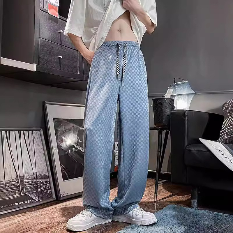 Férfi casual nadrág jacquard mintás, szakadt hatású és lyukakkal, magas derék, laza szabás, hosszú, széles lábú