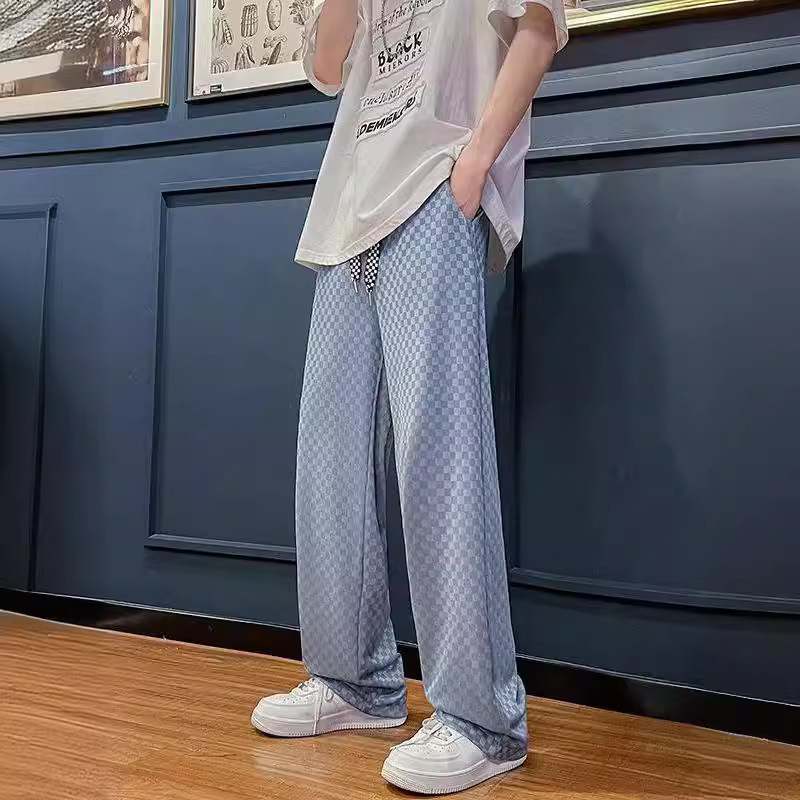 Férfi casual nadrág jacquard mintás, szakadt hatású és lyukakkal, magas derék, laza szabás, hosszú, széles lábú