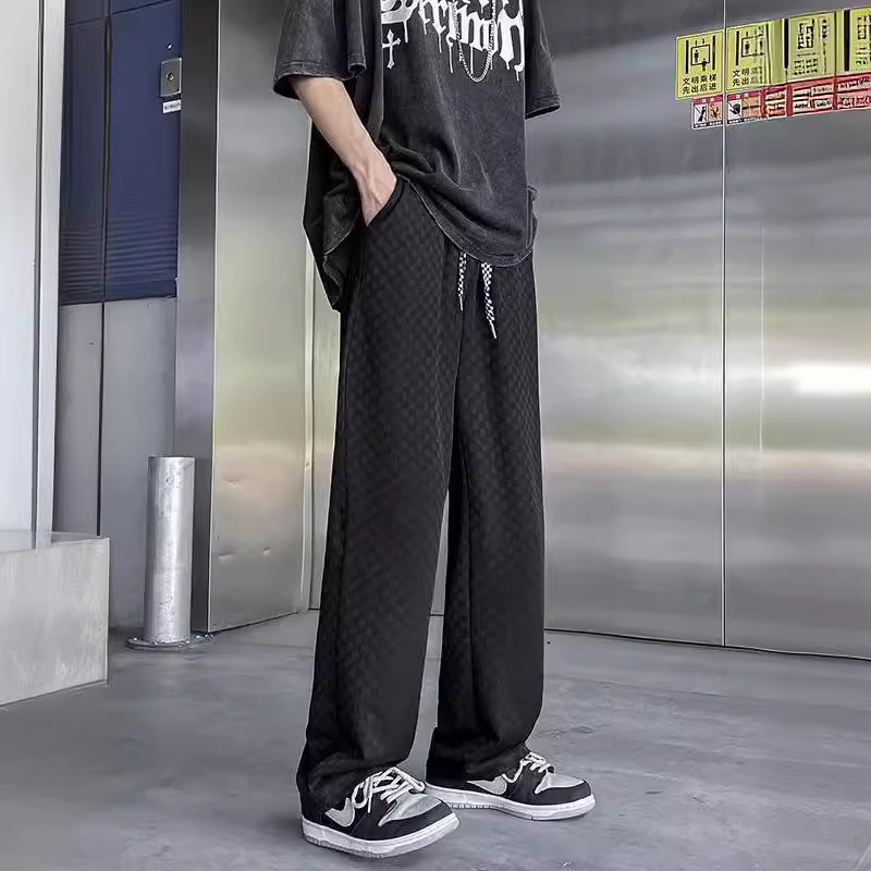 Férfi casual nadrág jacquard mintás, szakadt hatású és lyukakkal, magas derék, laza szabás, hosszú, széles lábú