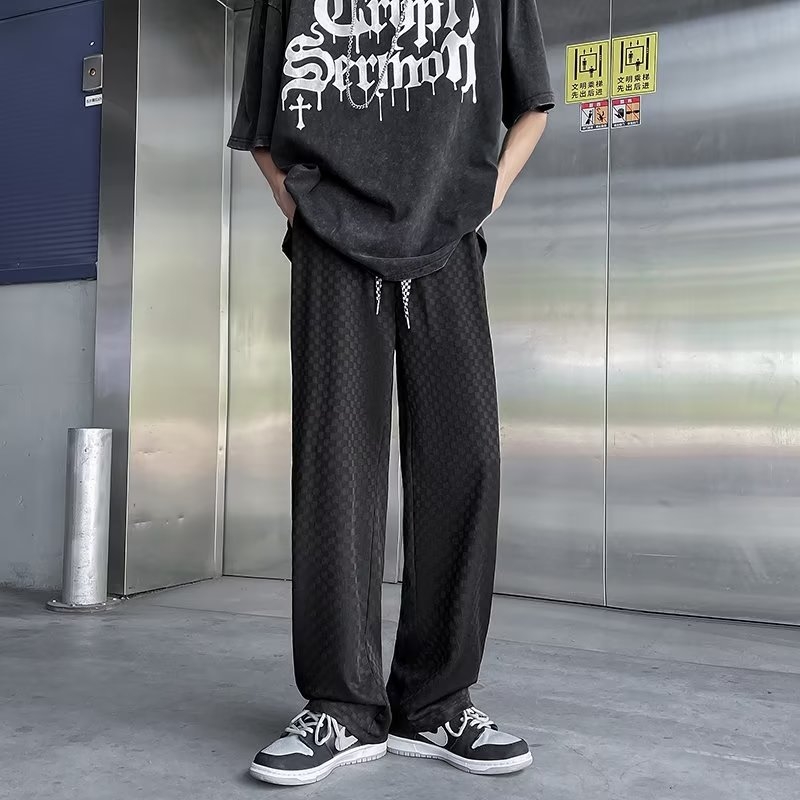 Férfi casual nadrág jacquard mintás, szakadt hatású és lyukakkal, magas derék, laza szabás, hosszú, széles lábú