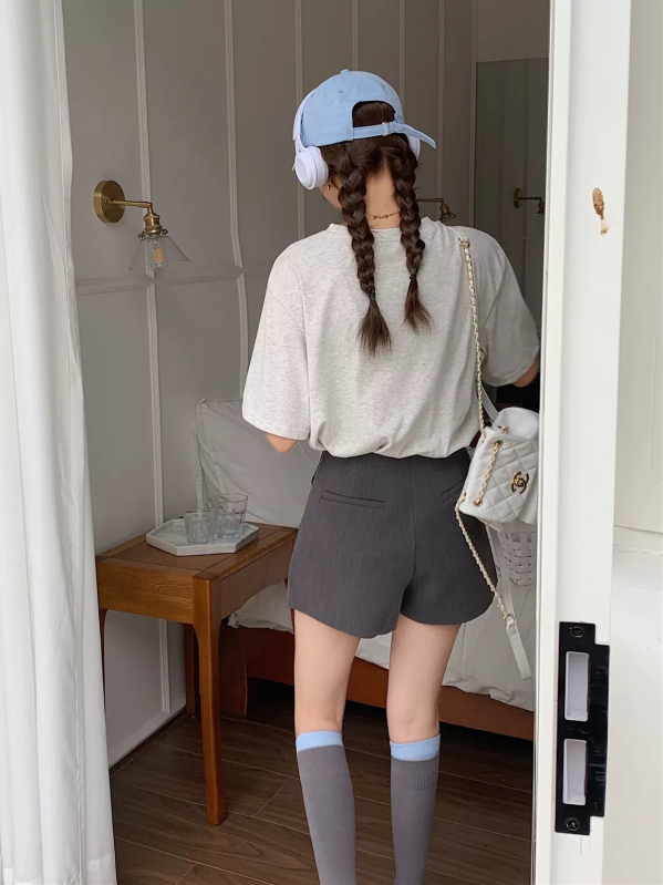 Ženske asimetrične suknje-pantalone, visoki struk, vizualno sužavaju trbuh, proljeće-ljeto, školski stil