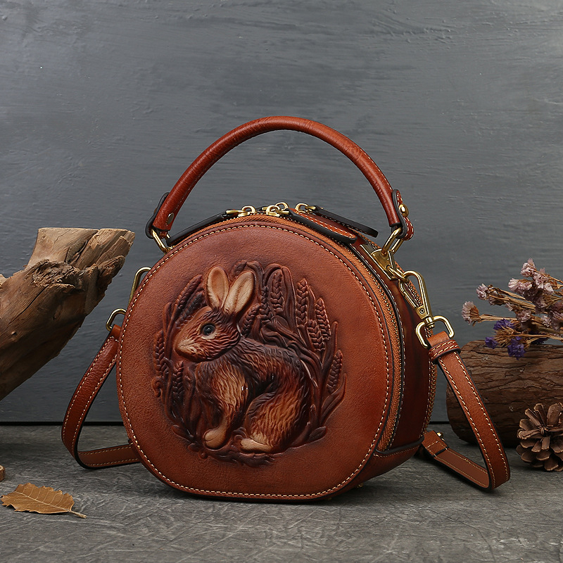 Ženska kožna torba s reljefom, elegantna kružna torba za rame ili crossbody u etno-umjetničkom stilu