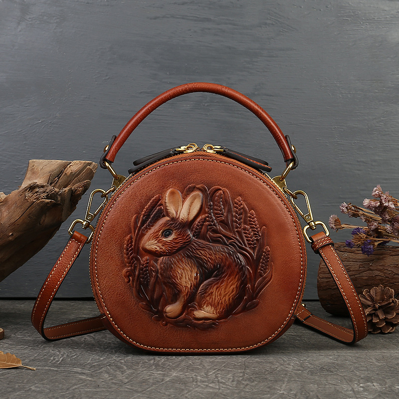 Ženska kožna torba s reljefom, elegantna kružna torba za rame ili crossbody u etno-umjetničkom stilu