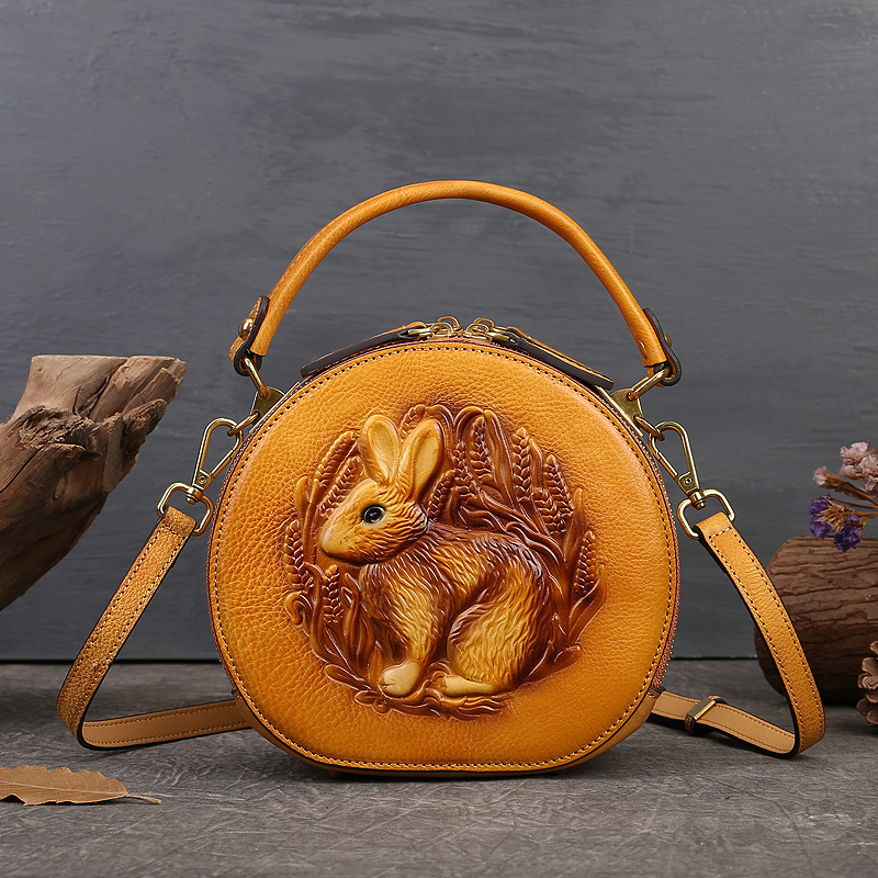 Ženska kožna torba s reljefom, elegantna kružna torba za rame ili crossbody u etno-umjetničkom stilu
