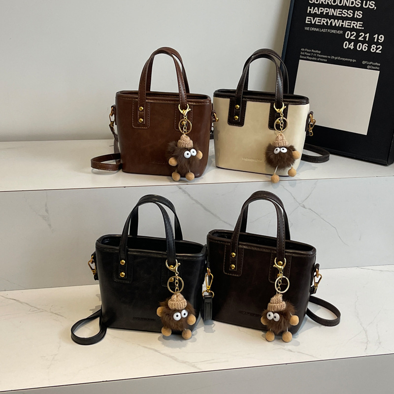 Ženska torba od PU kože, mali kvadratni oblik, preko ramena i križno nošenje, gradski stil, kompaktna bucket torba sa zatvaračem, podstava poliester, svakodnevna uporaba