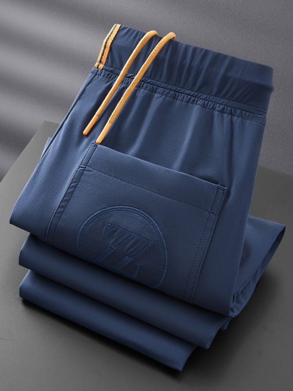 Muške crop pantalone od ice silk s izšivkom, uski kroj, lagane za ljeto