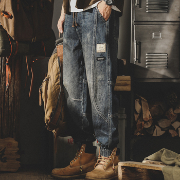 Férfi denim nadrág, mosott pamutból, lazán szabott, széles szárú, patchwork részletekkel, tavasz–ősz
