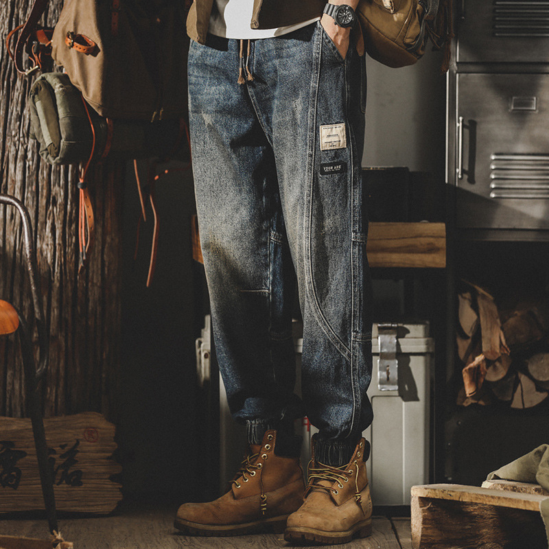 Férfi denim nadrág, mosott pamutból, lazán szabott, széles szárú, patchwork részletekkel, tavasz–ősz
