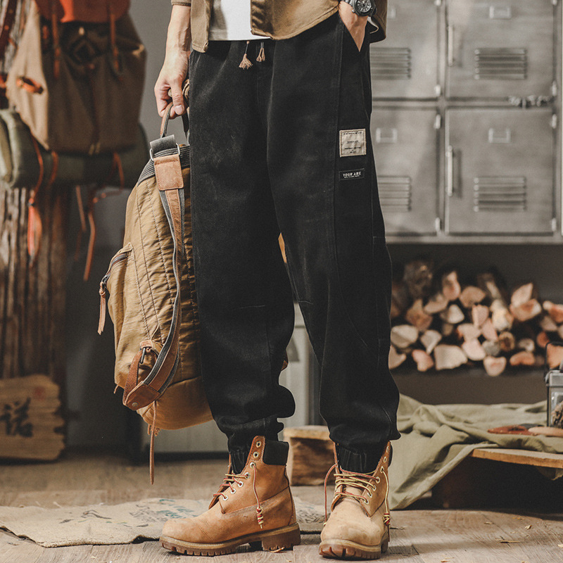 Férfi denim nadrág, mosott pamutból, lazán szabott, széles szárú, patchwork részletekkel, tavasz–ősz