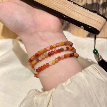 Elastična višeslojna narukvica od prirodnih kamenčića i školjki, ručna izrada, za žene