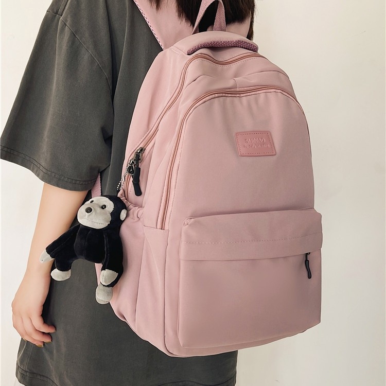 Školský ruksak v japonskom štýle, s dojmom prémiovej kvality, ľahký, s veľkým objemom z nylonu, minimalistický a svieži dizajn.