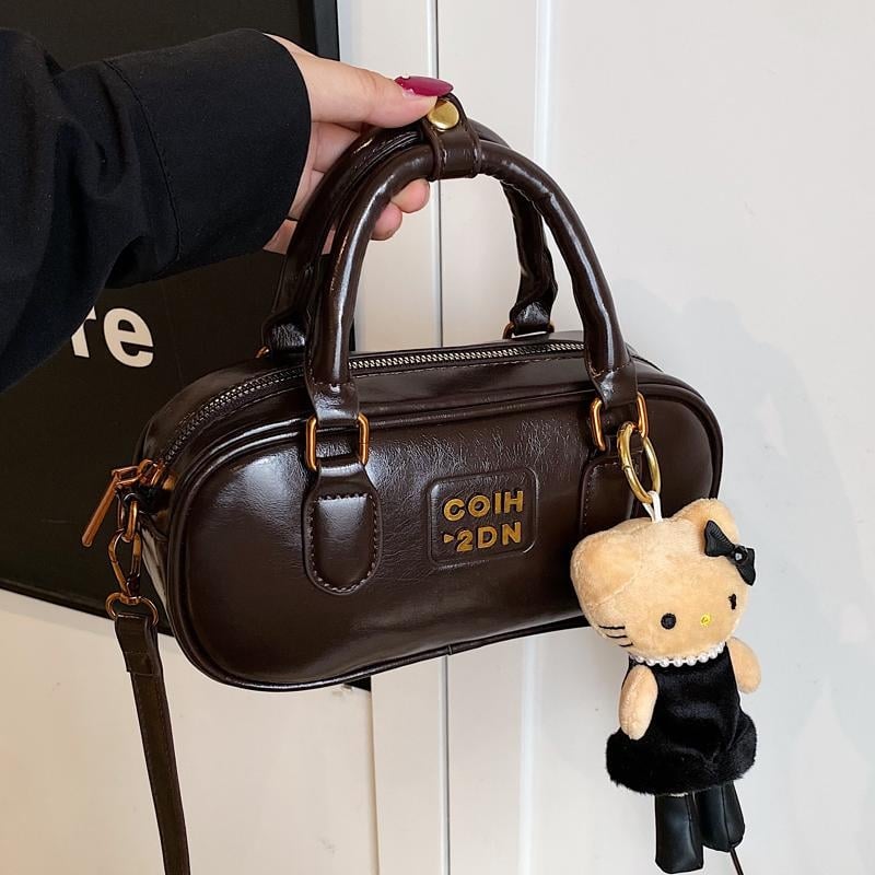 2025 jesen-zima nova korejska nišna retro bowling torba za žene, casual modni model preko ramena i crossbody