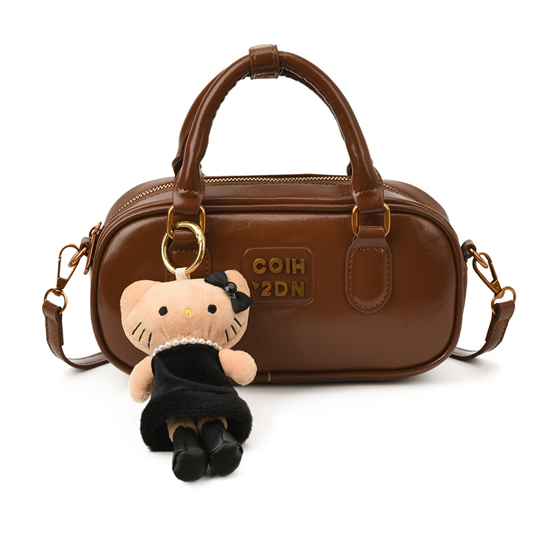 2025 jesen-zima nova korejska nišna retro bowling torba za žene, casual modni model preko ramena i crossbody