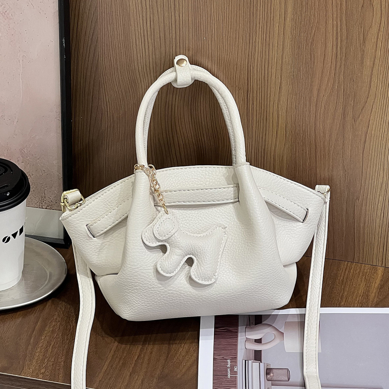 Ženska crossbody torbica, svestran minimalistički dizajn, mala kvadratna dumpling torbica, proljeće 2025
